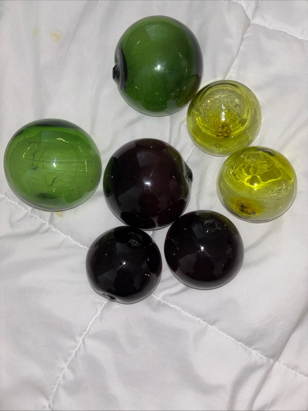 Decorative Glass Spheres in Green and Dark Purple